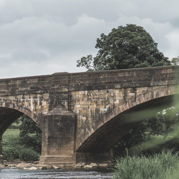 Couple on Edisford Bridge Engagement Photo