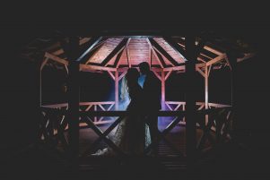 Creative Photography Image - Couple stood in front of a smoke bomb at night with creative lighting